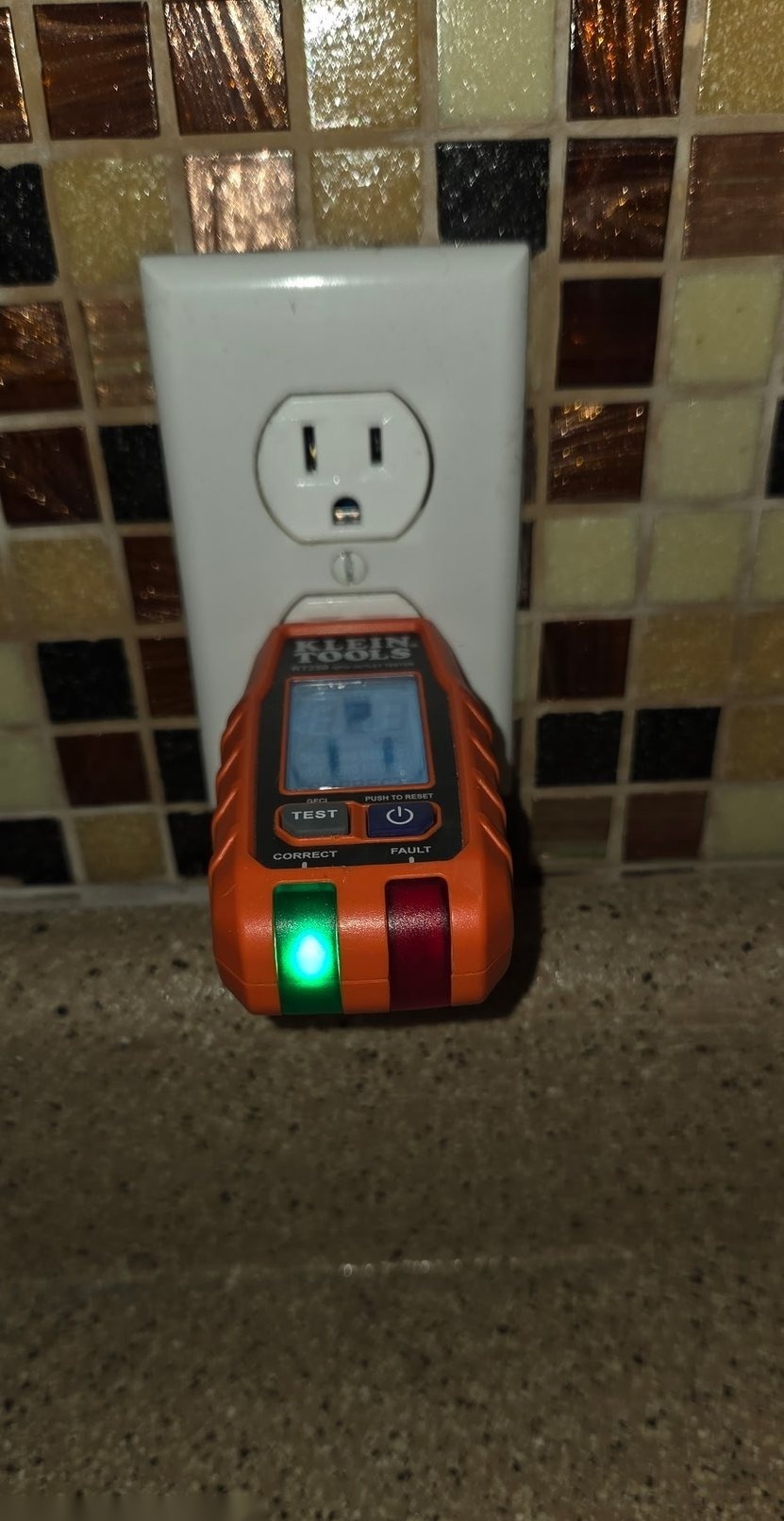 Electrical receptacle being tested